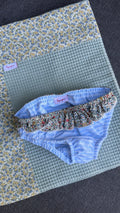 Slip bimba righe azzurre e balza fiorellini